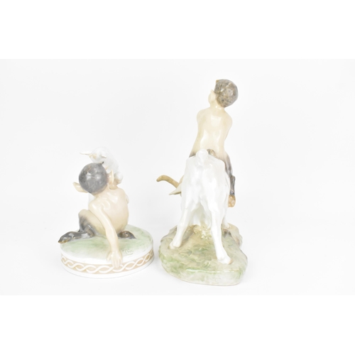 143 - Two Royal Copenhagen porcelain figures to include Faun riding on a goat, no. 737, 20cm high x 21cm w... 