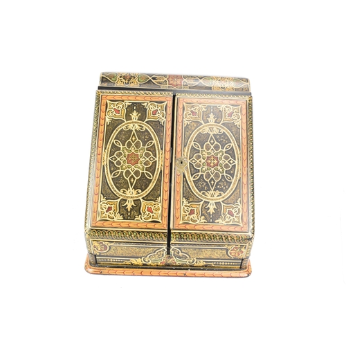 153 - A 19th century papier mache stationary box, painted with geometric designs in the Islamic style with... 