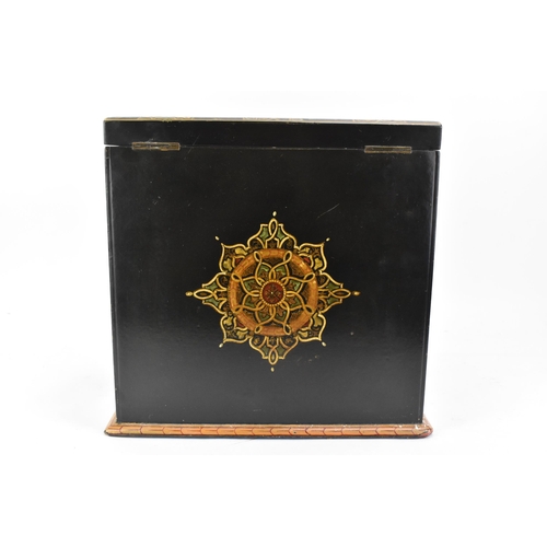 153 - A 19th century papier mache stationary box, painted with geometric designs in the Islamic style with... 