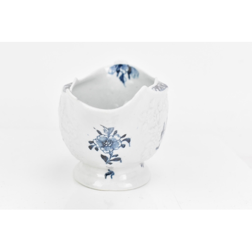 165 - Two mid 18th century Lowestoft porcelain sauce boat, the bodies with an impressed design of flowers ... 