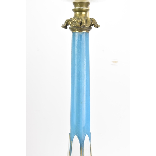 189 - A Victorian gilt brass mounted blue opaline glass table lamp, converted from an oil lamp, having a c... 