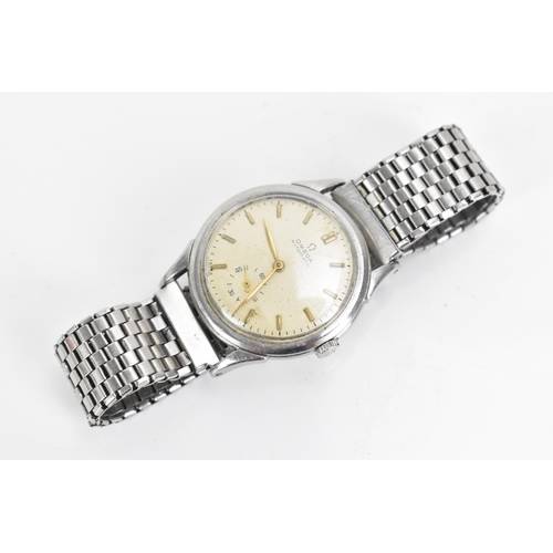 19 - An Omega, automatic, gents, stainless steel wristwatch, circa 1940s, the dial having gilt baton mark... 