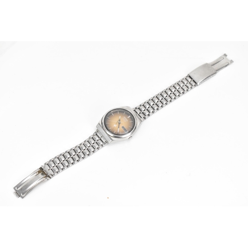 20 - A Seiko Type II, quartz, gents, stainless steel wristwatch, circa 1970s, having a brown dial with ba... 