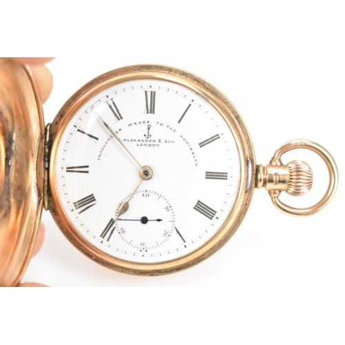 22 - An early 20th century 9ct gold, full hunter, keyless would pocket watch, the white enamel dial inscr... 