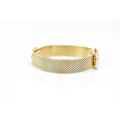 25 - A Movado, manual wind, ladies, 9ct gold cocktail wristwatch, fashioned as a watch strap with a hinge... 