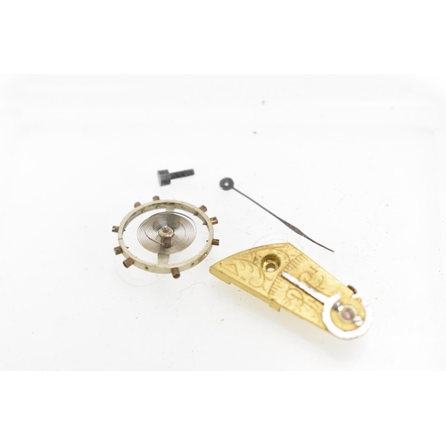 31 - An early 20th century Rolex pocket watch movement, having a white enamel dial with Arabic numerals, ... 