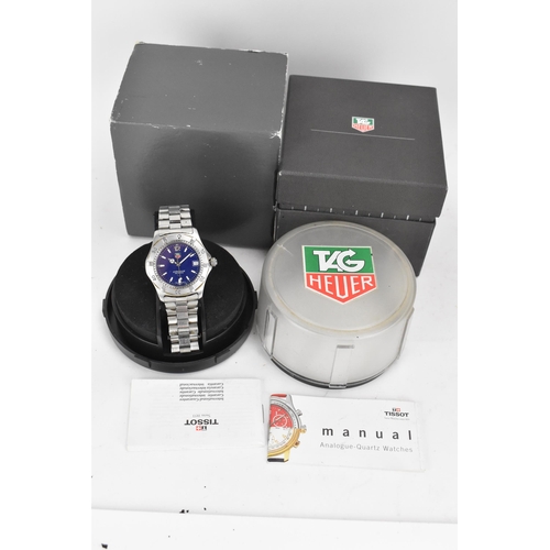 35 - A Tag Heuer Professional 200m, quartz, gents, stainless steel wristwatch, having a blue dial with ba... 