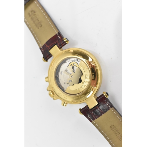 36 - A Stauer, automatic, gents, gold plated stainless steel wristwatch, the dial having three subsidiary... 