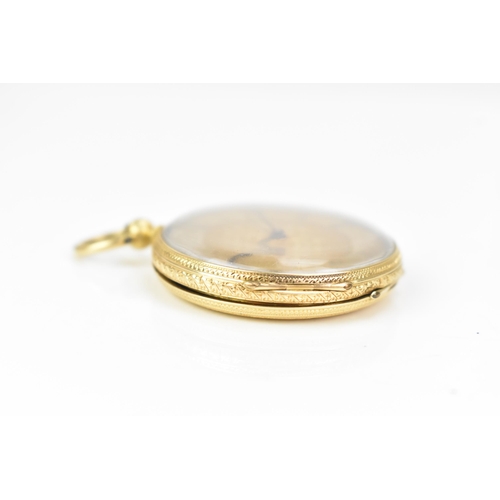 39 - A late 19th century 18ct gold, open face fob watch, the gilt dial engine turned with a floral centre... 