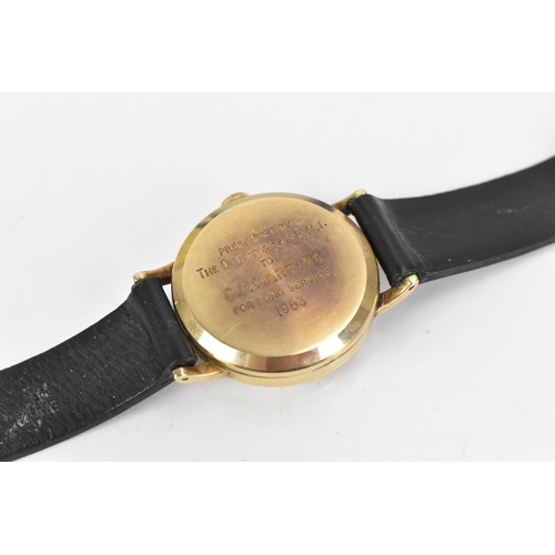 41 - A Smiths, manual wind, gents, 9ct gold wristwatch, having a silvered dial with gilt hands, case back... 