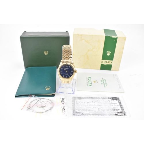 50 - A Rolex Oyster Perpetual Chronometer, automatic, gents, 14ct gold wristwatch, circa 1969, the blue d... 