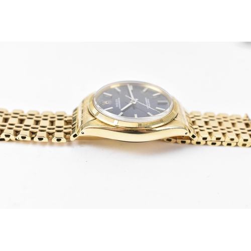 50 - A Rolex Oyster Perpetual Chronometer, automatic, gents, 14ct gold wristwatch, circa 1969, the blue d... 