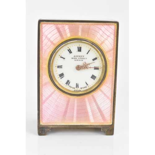 52 - An early 20th century Asprey silver miniature travel clock, sponsor marks for Charles William Guigna... 