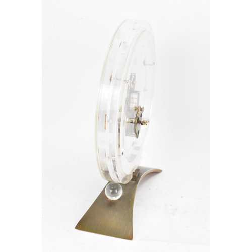 54 - A 1960's Jaeger LeCoultre floating skeleton clock, having a perspex case with visible 8-day movement... 