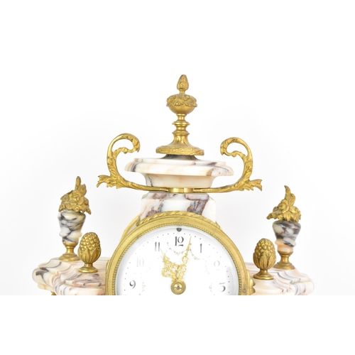 58 - A late 19th century French marble and gilt metal clock garniture, the clock or architectural form wi... 