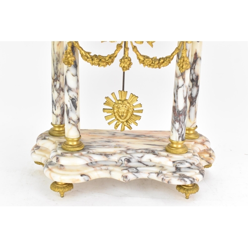 58 - A late 19th century French marble and gilt metal clock garniture, the clock or architectural form wi... 