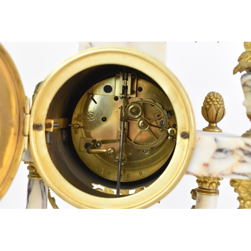 58 - A late 19th century French marble and gilt metal clock garniture, the clock or architectural form wi... 