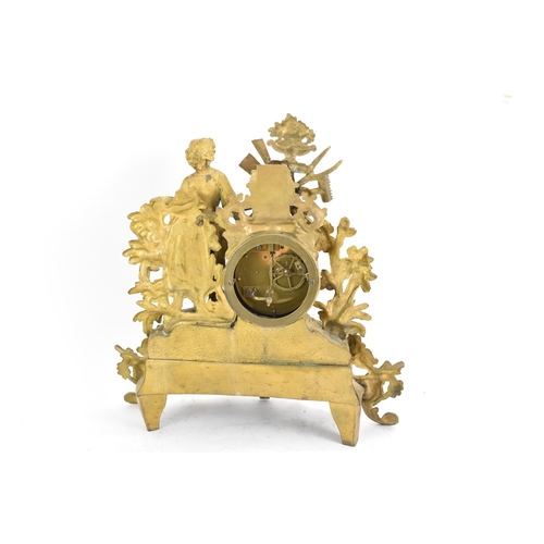 59 - A late 19th century French spelter mantle clock, the gilded case fashioned as a shepherdess leaning ... 