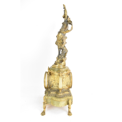 62 - A late 19th century French spelter and onyx mantle clock, mounted with a classical maiden above ribb... 