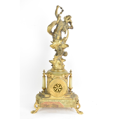 62 - A late 19th century French spelter and onyx mantle clock, mounted with a classical maiden above ribb... 