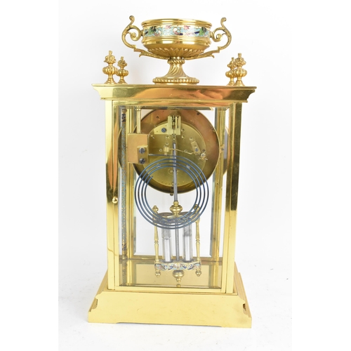 63 - A circa 1900 French gilt metal and cloisonne mantle clock, having a twin scroll handled urn formed f... 