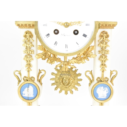 64 - A late 19th century French gilt metal and white marble portico clock and two garnitures, the clock h... 