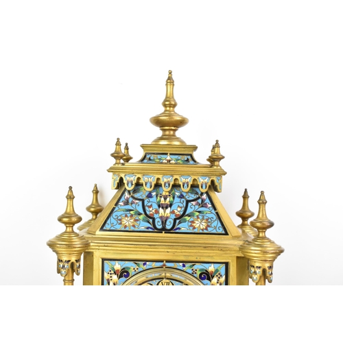 66 - A late 19th century French champleve enamel mantle clock, the case of architectural form with turned... 