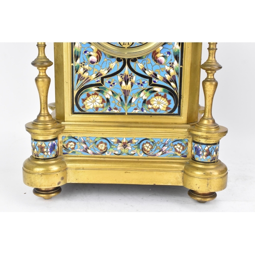 66 - A late 19th century French champleve enamel mantle clock, the case of architectural form with turned... 