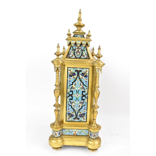 66 - A late 19th century French champleve enamel mantle clock, the case of architectural form with turned... 