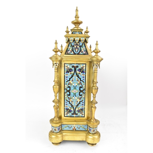 66 - A late 19th century French champleve enamel mantle clock, the case of architectural form with turned... 