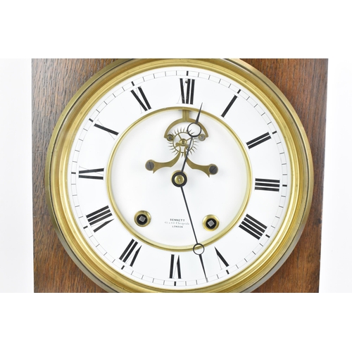 68 - A late 19th century oak cased mantle clock, the white enamel dial having Roman numerals, Breguet sty... 