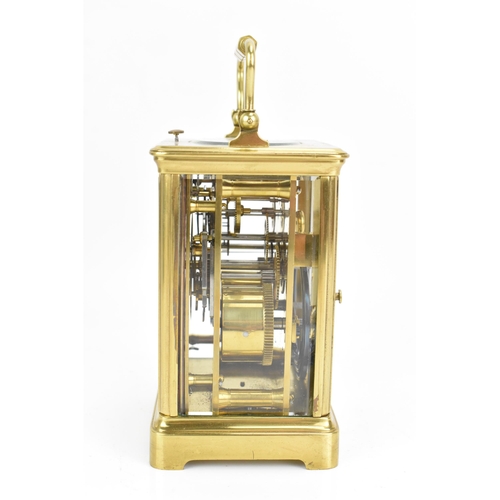 71 - An early 20th century repeating brass cased carriage clock, having a white enamel roman dial, repeat... 