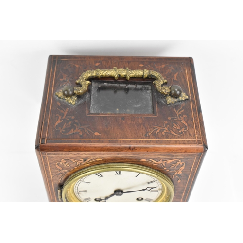 72 - A late 19th century French rosewood mantle clock, the case having a gilt metal handle and with flora... 