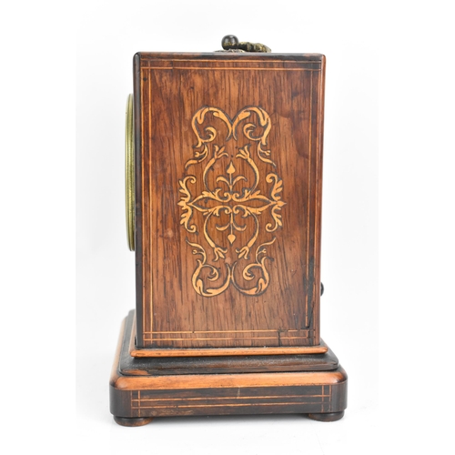 72 - A late 19th century French rosewood mantle clock, the case having a gilt metal handle and with flora... 