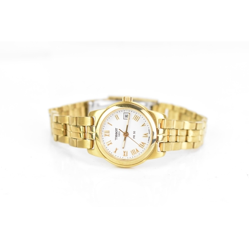 73 - A Tissot PR 50, quartz, ladies, gold plated wristwatch, having a white dial with Roman numerals, cen... 