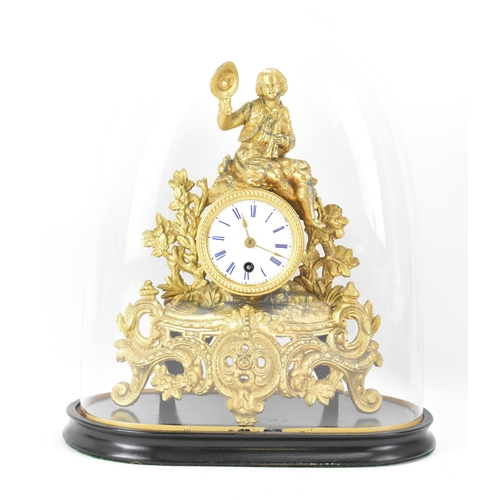 84 - A late 19th century French gilt metal mantle clock and dome, the case fashioned as a gent seated ato... 