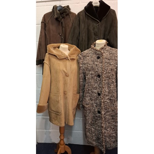 73 - A group of late 20th Century ladies coats to include a brown faux sheepskin coat, UK12, a Jobis raci... 