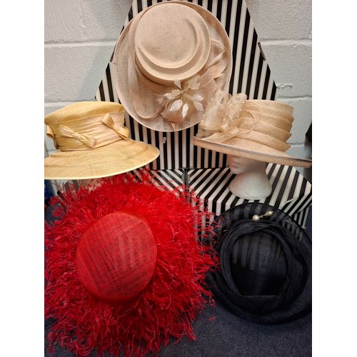 71 - A group of formal ladies hats to include a Cappelli Condici beige straw hat with large bow, a gold c... 