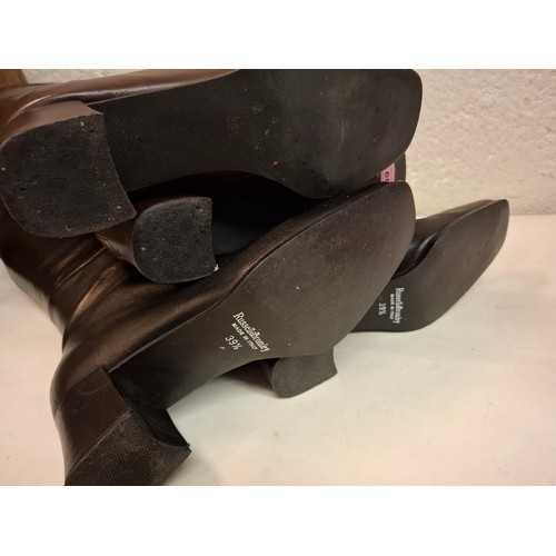 68 - Two pairs of ladies leather boots comprising a pair of Russell & Bromley black knee high boots with ... 