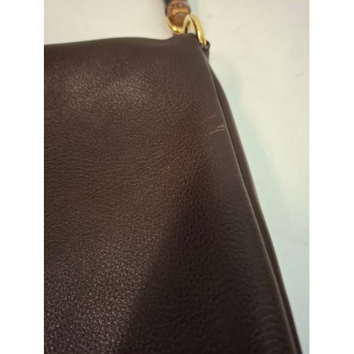 34 - Serapian- A vintage Stefano Serapian soft brown leather hand bag with bamboo handle and gold tone ha... 