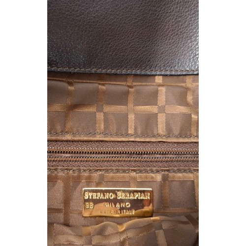 34 - Serapian- A vintage Stefano Serapian soft brown leather hand bag with bamboo handle and gold tone ha... 