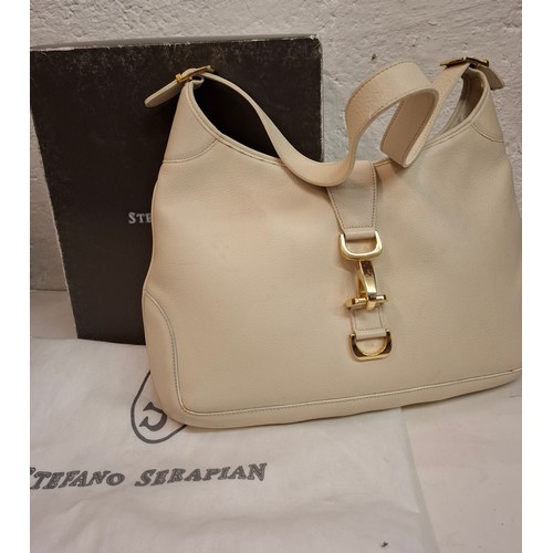 31 - Serapian-Two vintage shoulder bags comprising a Stefano Serapian light beige '4568' leather shoulder... 