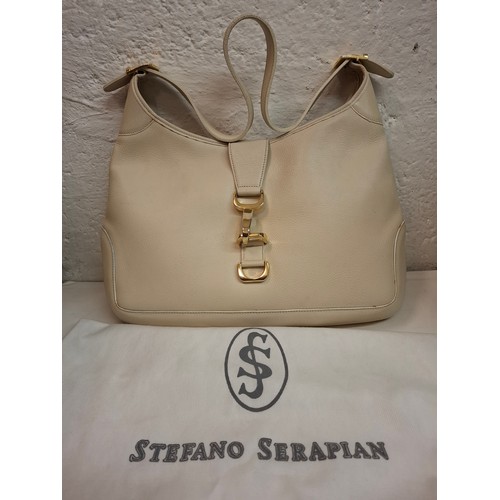 31 - Serapian-Two vintage shoulder bags comprising a Stefano Serapian light beige '4568' leather shoulder... 