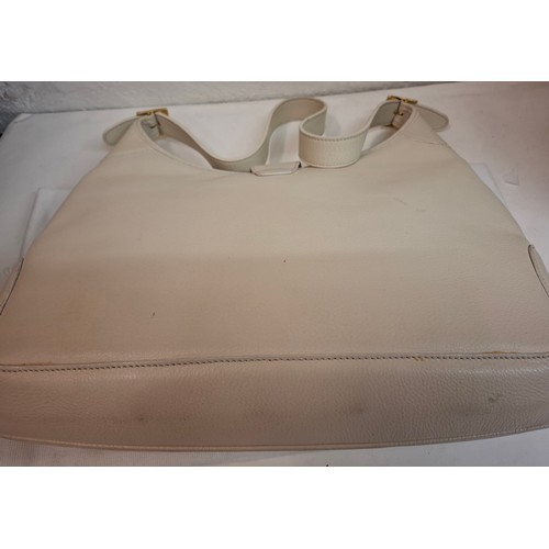 31 - Serapian-Two vintage shoulder bags comprising a Stefano Serapian light beige '4568' leather shoulder... 