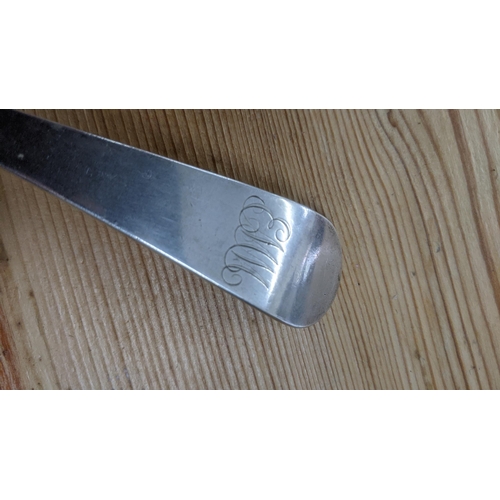 102 - A George Burrows silver basting spoon having engraved initials to the terminals, hallmarked London 1... 