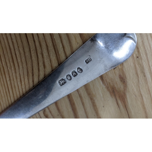 102 - A George Burrows silver basting spoon having engraved initials to the terminals, hallmarked London 1... 