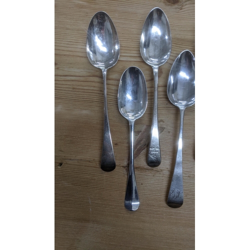 108 - A group of 7 English silver table spoons to include one example made by Smith and Fern London 1792 t... 