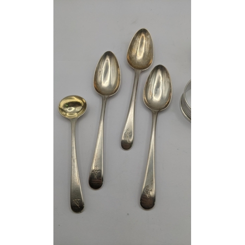 119 - Silver to include three teaspoons, two napkin rings and two condiment spoons total weight 12.3g alon... 