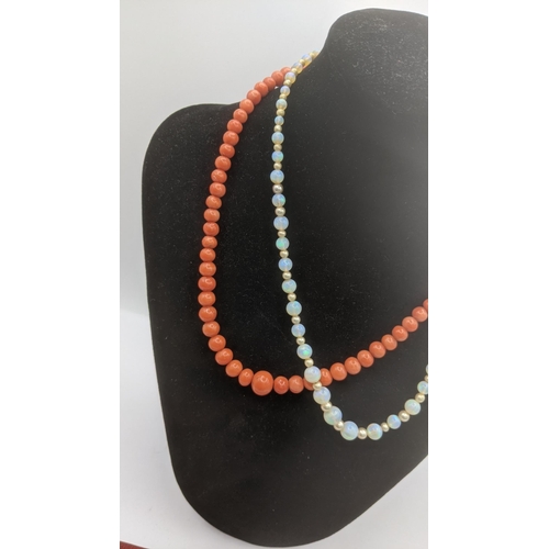 143 - A graduated coral beaded necklace with a 9ct yellow gold clasp together with an opal and pearl style... 