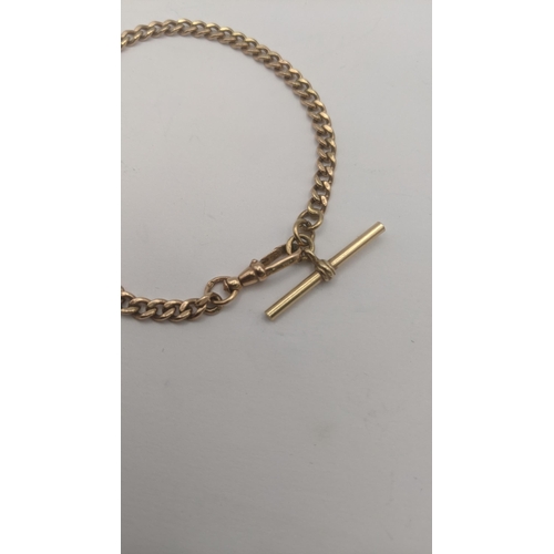 145 - A 9ct rose gold flat curb link bracelet and bulldog clasp, with a yellow metal t-bar, tested as 9ct ... 